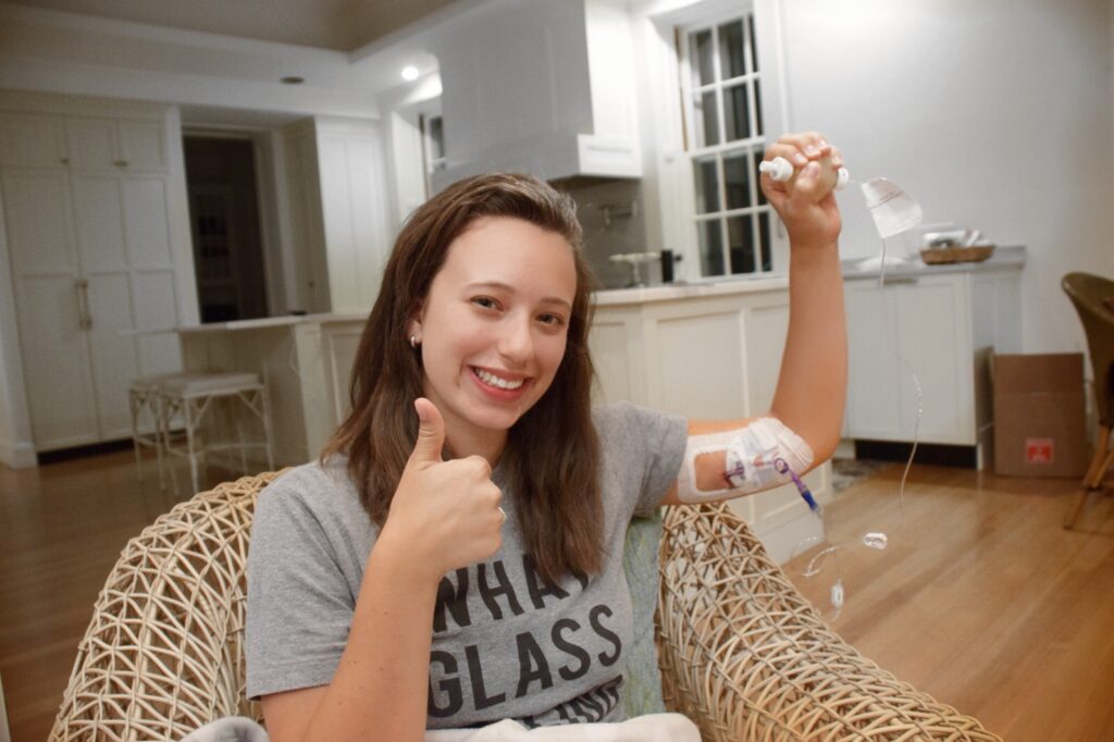 Emily Levy, founder of Mighty Well, doing treatment with a PICC line