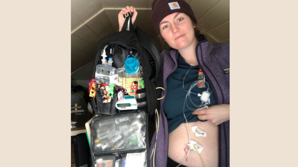 a patient with a feeding tube shows off her organized medication in the Fluid Motion Backpack. 